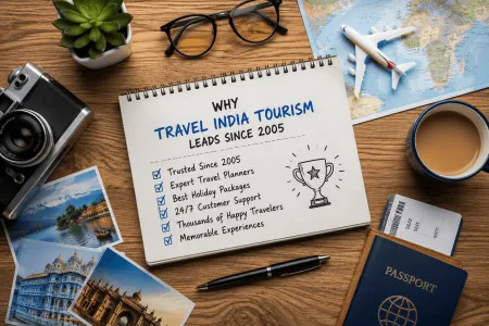 Travel planning essentials on wooden desk
