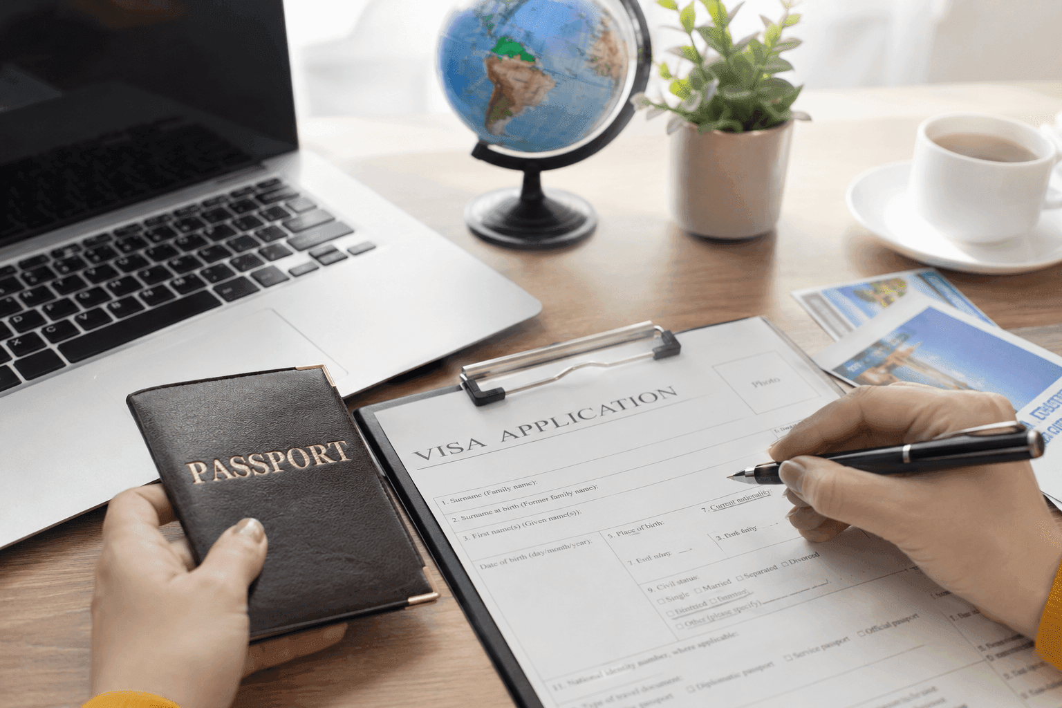 Visa application workspace with globe